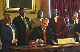 File photo: Govenor Chet Culver signs a bill in is first year in office