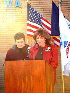 Geri Nisely, widow of Scott Nisely, and  her son Justin Nisely.