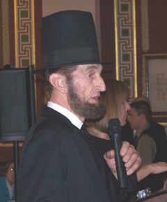 Stan De Haan portrays Abraham Lincoln