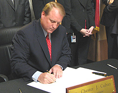 Govenor Chet Culver, shown here signing the smoking ban bill, says he will likely sign a bill that gives him a raise.