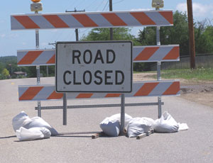 Road closed signs are common in Iowa with all the flooding.