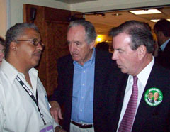 AFSCME leader Gerald McEntee and Iowa Senator Tom Harkin talk with delegate.