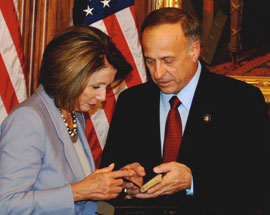 House Speaker Nancy Pelosi and Iowa Congressman Steve King examine King's Civil War era bible.