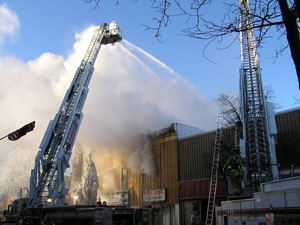 Firefighters work to control fire in downtown Boone.