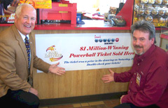 Lottery director Terry Rich, Tracy Unker of Kwik Star. 