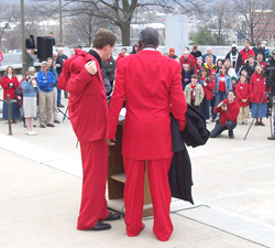 Chuck Hurley and Reverend Keith Ratliff wear red suits at rally asking for Consitutional Amendment on gay marriage.