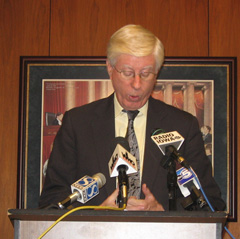 Attorney General Tom Miller talks at Wednesday news conference.