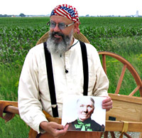 Lynn Cleland holds a picture of his grandmother.