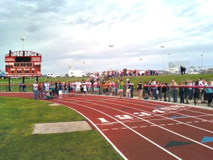 Fans gathered at the Aplington-Parkersburg football field Wednesday to honor Ed Thomas.