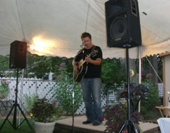 Chad Elliott performs at backyard concert.