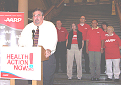 A.A.R.P. state director speaks about health care at the Iowa statehouse.