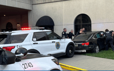 Des Moines driver rams squad car as walkers scurry from sidewalk