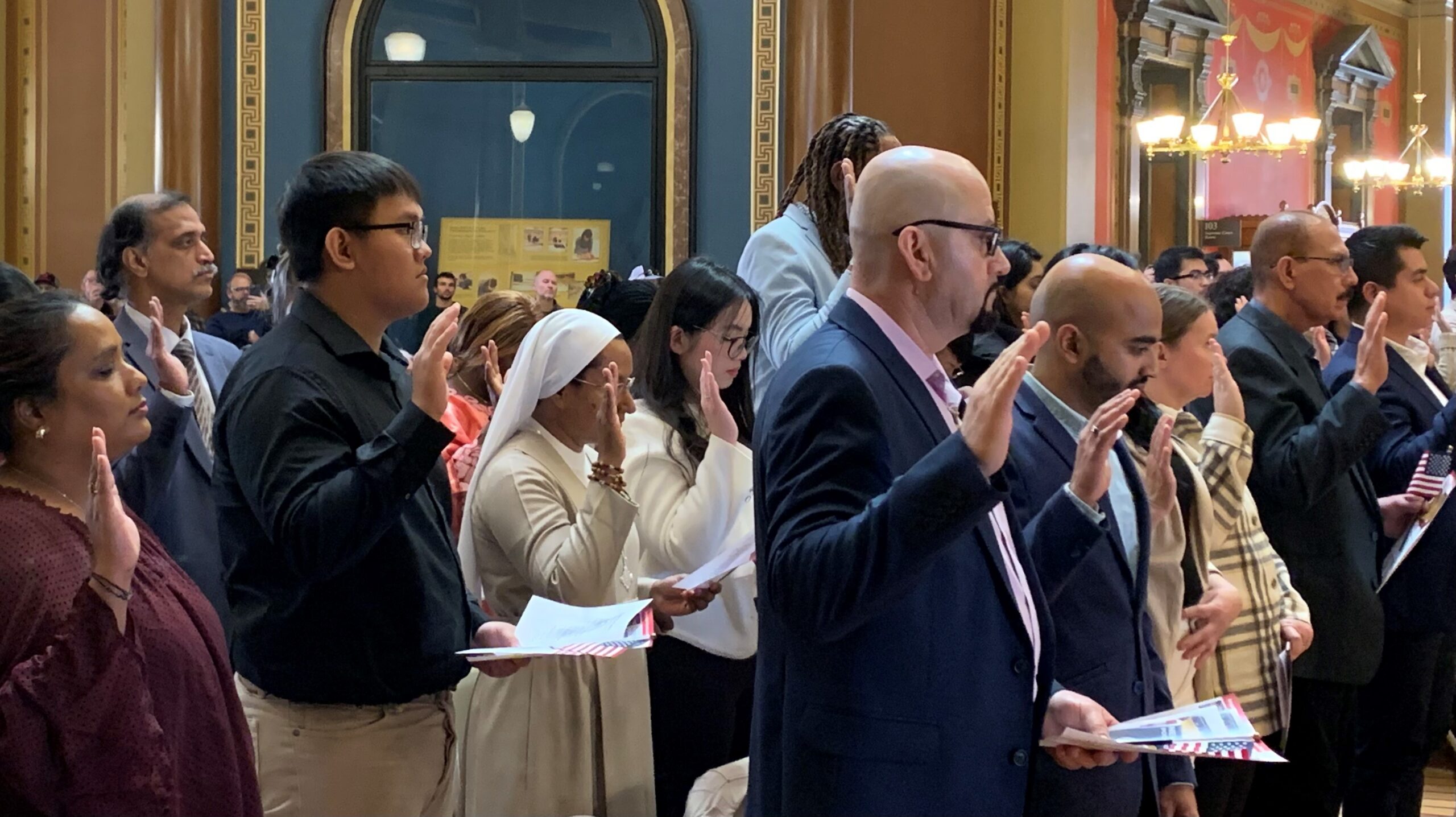 Naturalization ceremony at Iowa Capitol for new U.S. citizens
