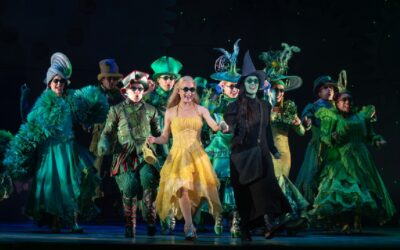 Iowa native is ‘den mother’ for cast and crew of Wicked, and 13 tractor trailers (AUDIO)